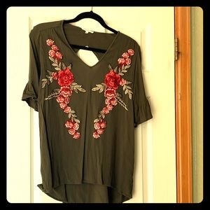 Top with textured appliqué flowers